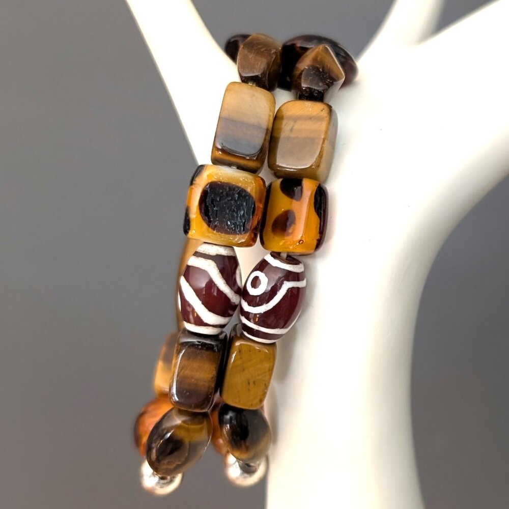 Pair of glass, bead and tiger's eye beaded stretch bracelets